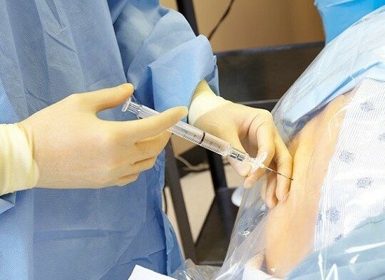 почему болит голова после наркоза